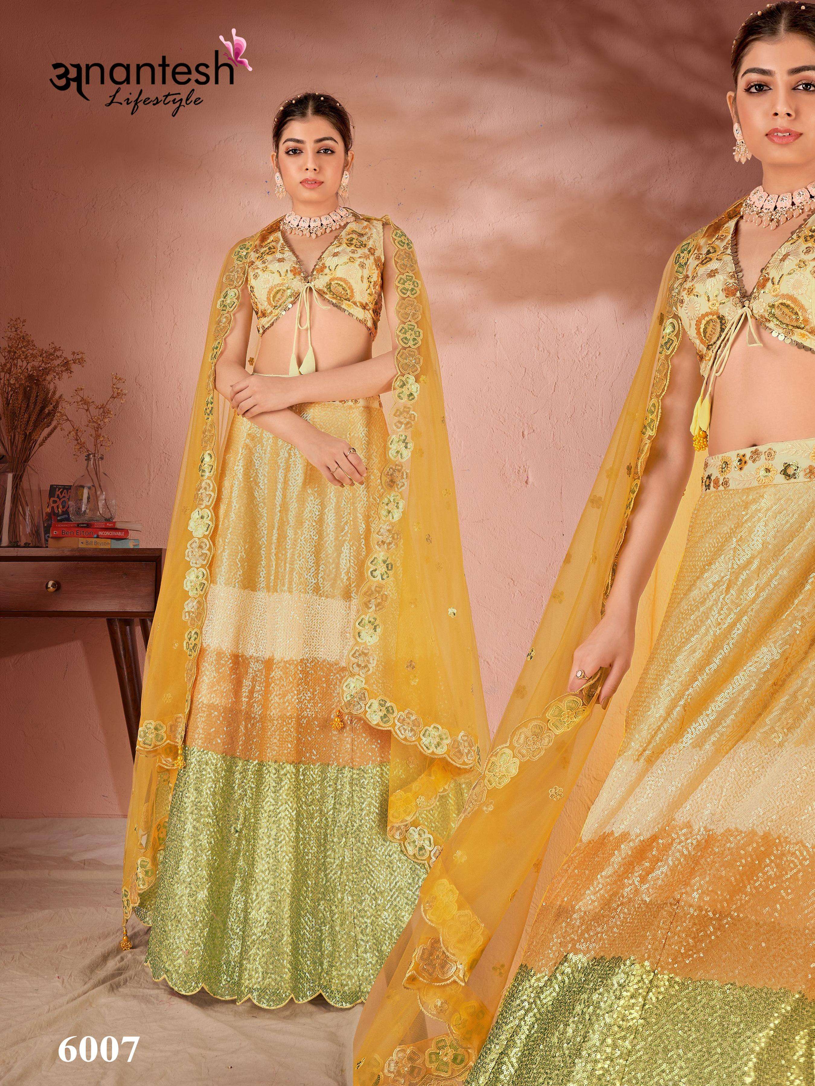 HALDI SPECIAL DESIGN By Anantesh Lifestyle  Net lehenga choli collection manufacturer surat 