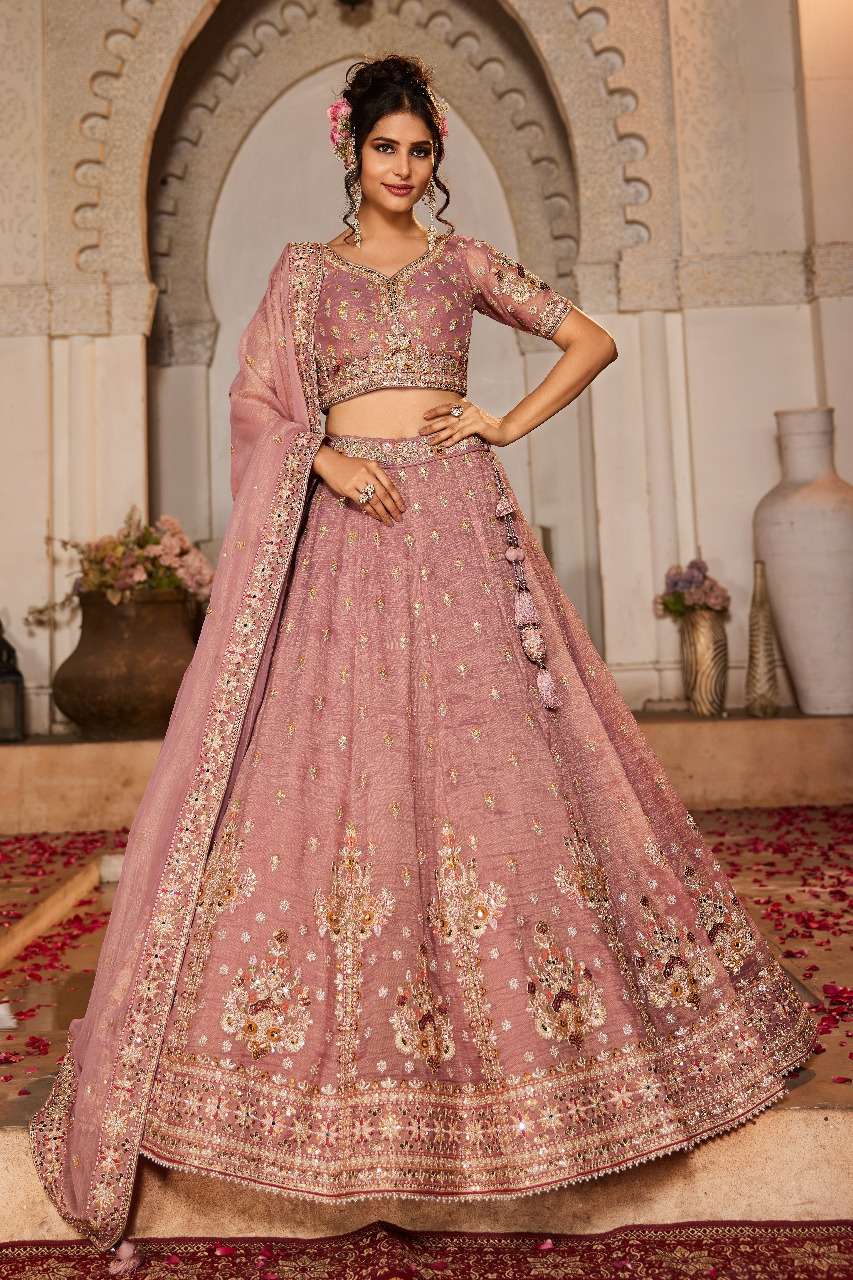 ADORN CRAFT SERIES 6106 Cream colored tissue fabric lehenga choli collection manufacturer surat 