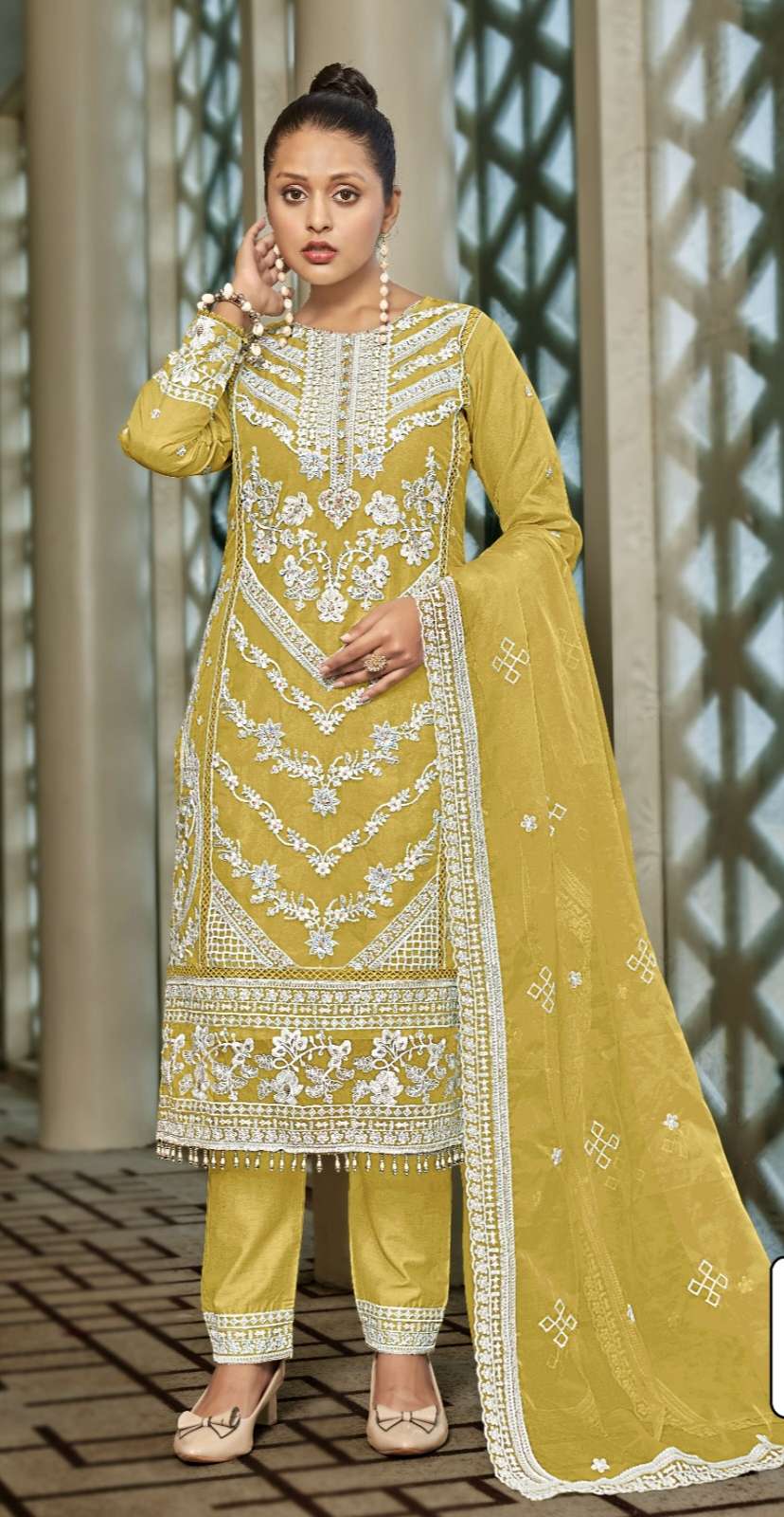 Design no 666 by Motifz Suit collection manufacturer Surat 